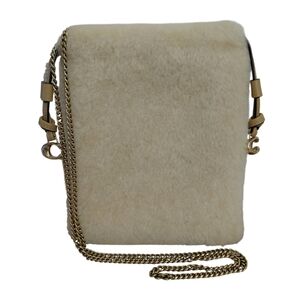 Coach Shearling Drawstring Pouch Crossbody Bag
